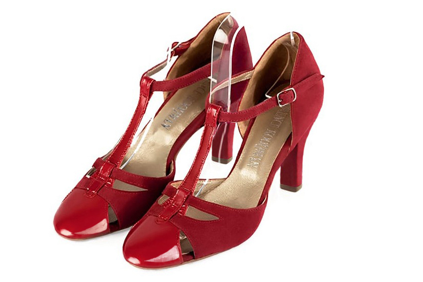 French elegance and refinement for these scarlet red dress T-strap open side shoes, 
                available in many subtle leather and colour combinations. A pretty model with a comfortable "Salomé" strap and good support.
Its charming spyglass cut-out gives you plenty of scope for personalisation.  
                Matching clutches for parties, ceremonies and weddings.   
                You can customize these shoes to perfectly match your tastes or needs, and have a unique model.  
                Choice of leathers, colours, knots and heels. 
                Wide range of materials and shades carefully chosen.  
                Rich collection of flat, low, mid and high heels.  
                Small and large shoe sizes - Florence KOOIJMAN